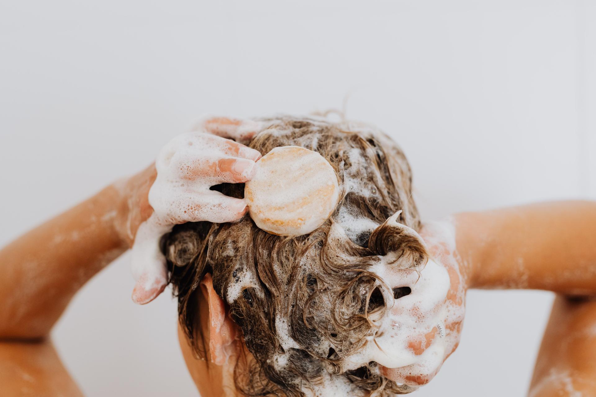 Why your hair gets greasy so fast — and how to train your scalp to need washing just once a week — Hair